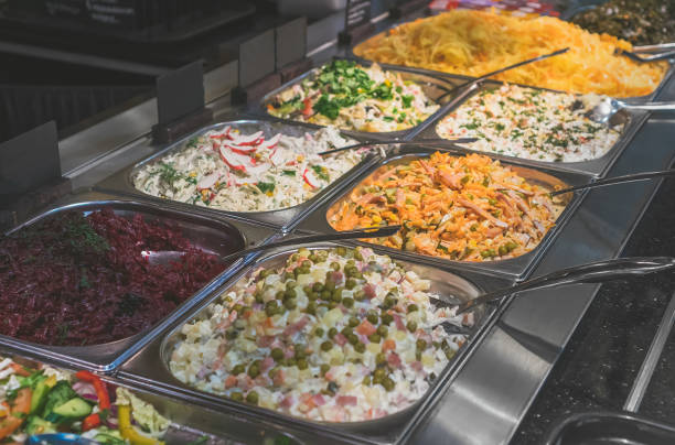 istock Stand with salads in the diner with self-service. 901722760