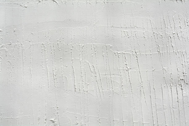 istock Oil paints on a canvas palette. White with grey shadows background. Abstract painting surface. 901729038