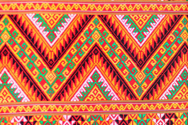 istock Colorful of native thai style silk and textiles pattern. Beautiful handmade woven fabrics thai silk fabric textured, with different native style patterns. 901736084