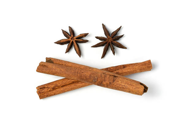 istock Brown vegeterian cinnamon sticks lying on white background 901736382