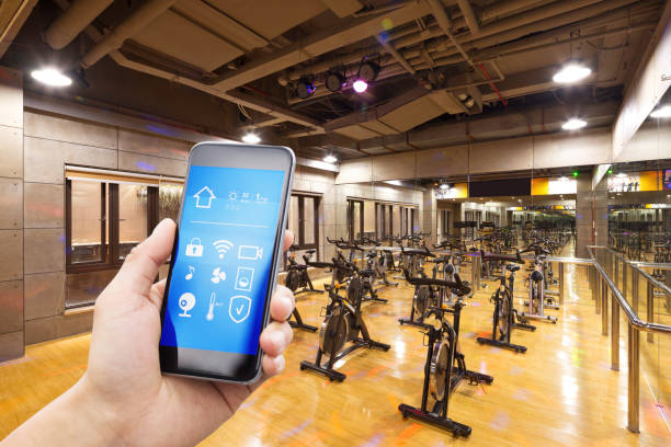 istock smart phone with smart home with modern gym 901736466
