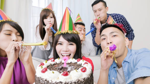 istock people with birthday party 901739468