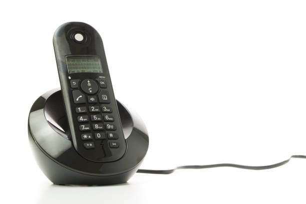 istock Cordless phone with charging station 901751058