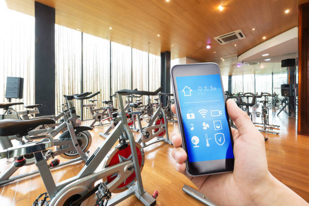 istock smart phone with smart home with modern gym 901751520