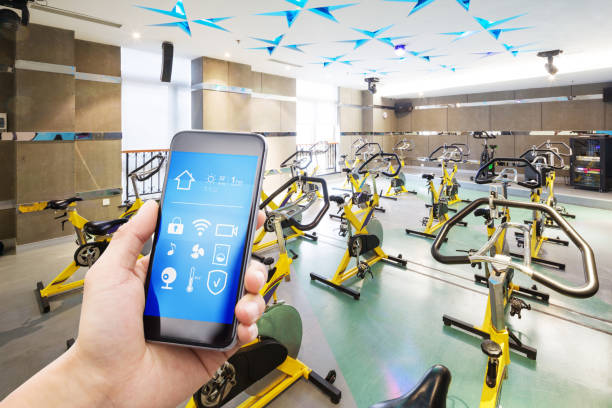 istock smart phone with smart home with modern gym 901762220