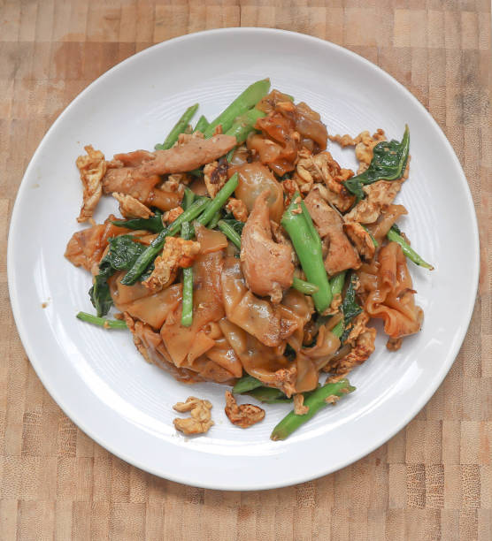 istock stir fried noodle with pork and kale 901766174