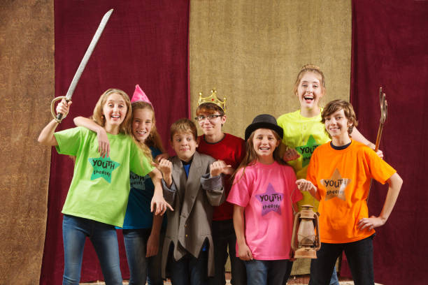 istock Young actors pose with costume pieces 901769268