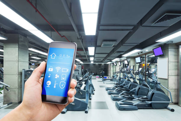 istock smart phone with smart home with modern gym 901772080