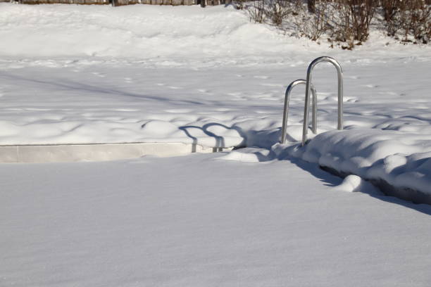 istock Ladder at a frozen Pool 901772544
