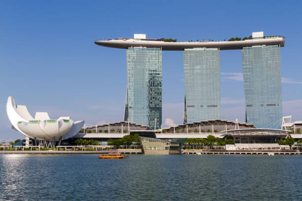 Marina Sands Bay, Singapore - July 29, 2016: Viewed from across Marina Bay, this Singapore landmark resort and convention-exhibition center is topped with the world's longest elevated swimming pool