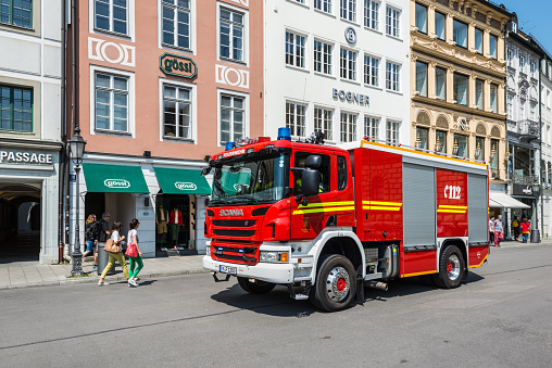 Munich, Germany - May 29, 2016: Fire truck in the streets of Munich after the parade in Munich, Bavaria, Germany (150 years since the founding of the Fire Brigade).