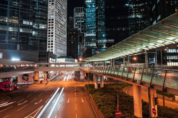 istock Modern night cityscape, blurred car lights 901788086