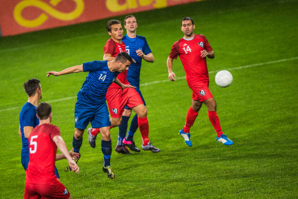 istock Soccer player heading the ball 901788214