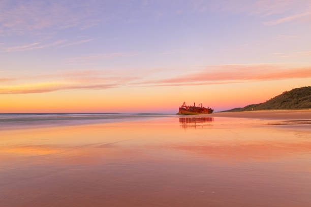 Sunrise at the Maheno Shipwreck on Fraser Island stock photo