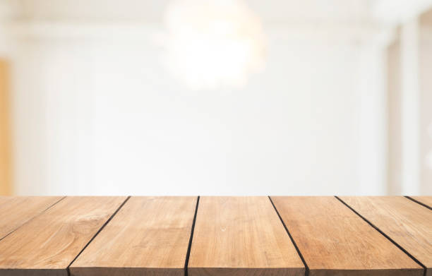 istock Empty wooden table and interior background, product display, blurred light interior background with bokeh 901797920