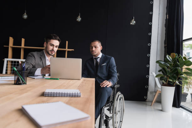 istock multiethnic businessmen working on laptop 901797996