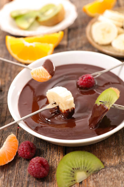 istock chocolate fondue and fruit 901801500