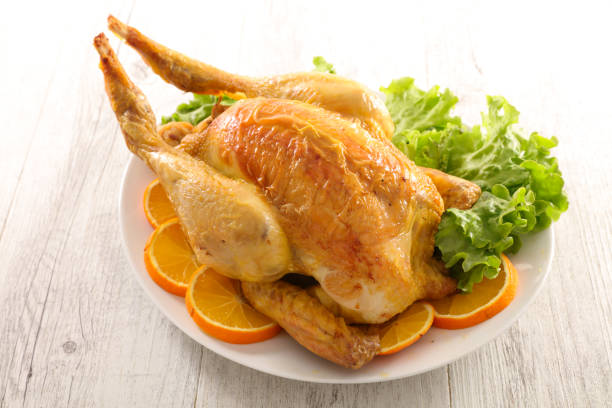 istock roast chicken with salad and orange 901801964