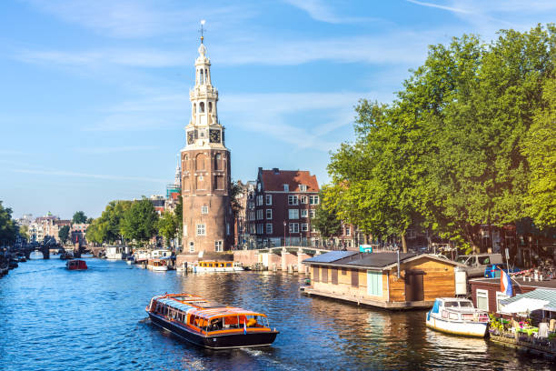 istock Amsterdam Canal with houseboats and ships 901806788
