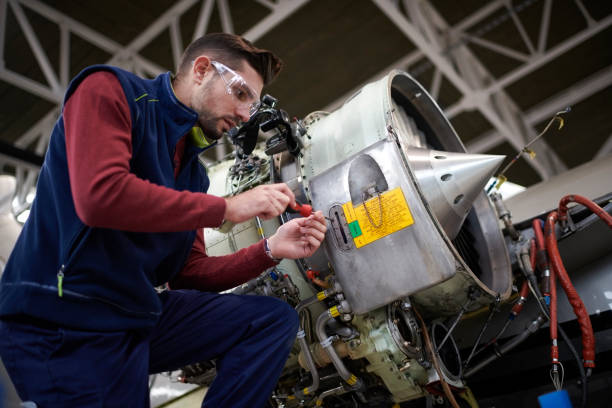 istock Aircraft mechanic in the hangar 901813444