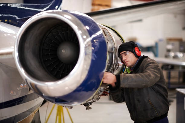 istock Aircraft mechanic in the hangar 901813608