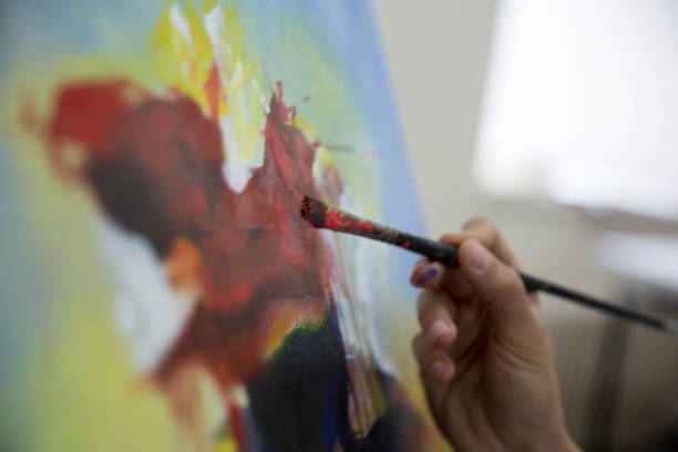 istock Fine art students working on painting 901813970