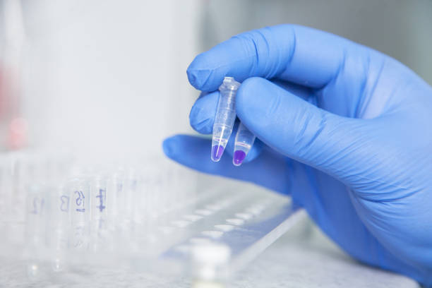 istock scientist or laboratory technician working with dispenser, a centrifuge, test tubes and other laboratory instruments 901814064