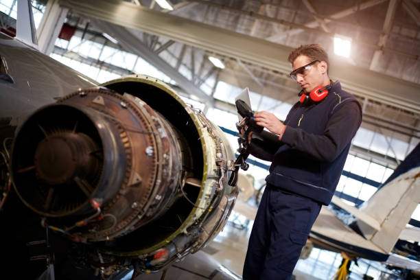 istock Aircraft mechanic in the hangar 901816746