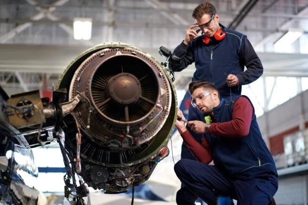 istock Aircraft mechanics in the hangar 901816750