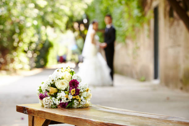 wedding bouquet on wooden bench