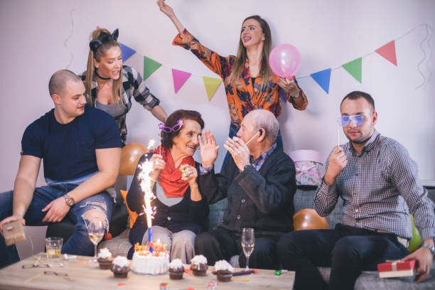 istock Family celebrating birthday at home 901822358