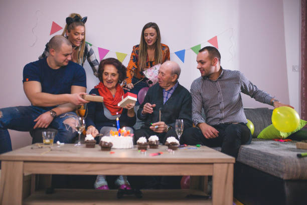 istock Family celebrating birthday at home 901822766