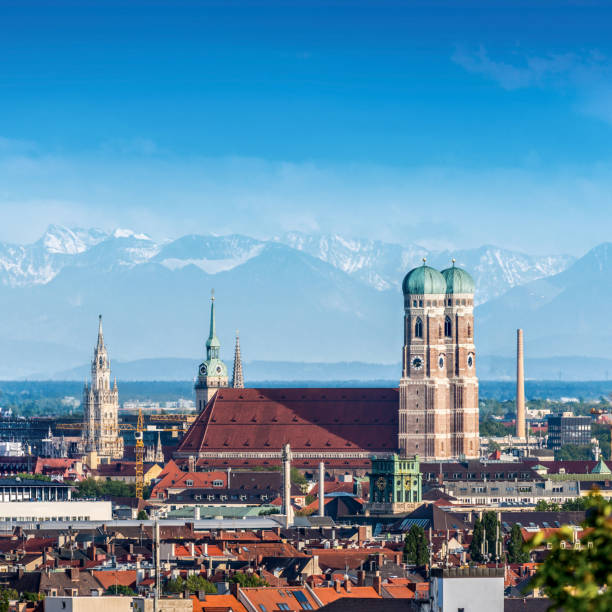 Munich, Germany Iconic Frauenkirche of Munich, Bavaria, Germany with alps in the background munich cathedral photos stock pictures, royalty-free photos & images
