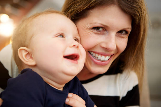 istock mother and little boy laughing together 901828452