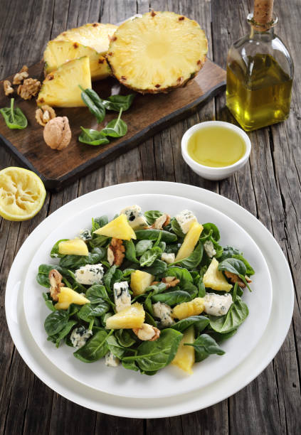 istock close-up of spinach cheese pineapple walnut salad 901838570
