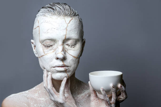 art portrait of woman covered in clay - sculpture clay human face human head imagens e fotografias de stock