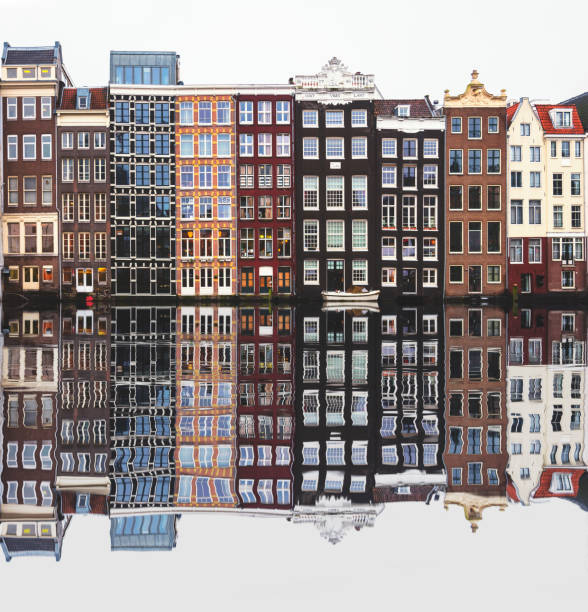 istock Typical Dutch houses built by the canal, Amsterdam, Netherlands 901845518