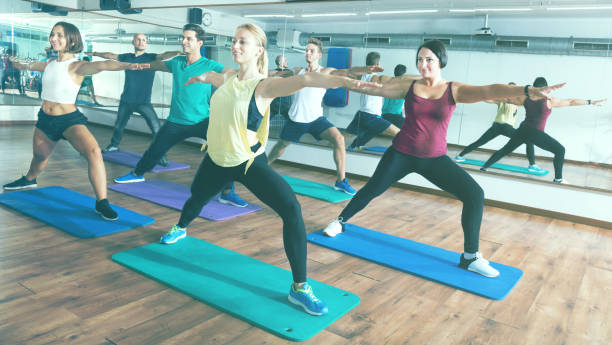 istock Happy adults having group fitness class 901850320