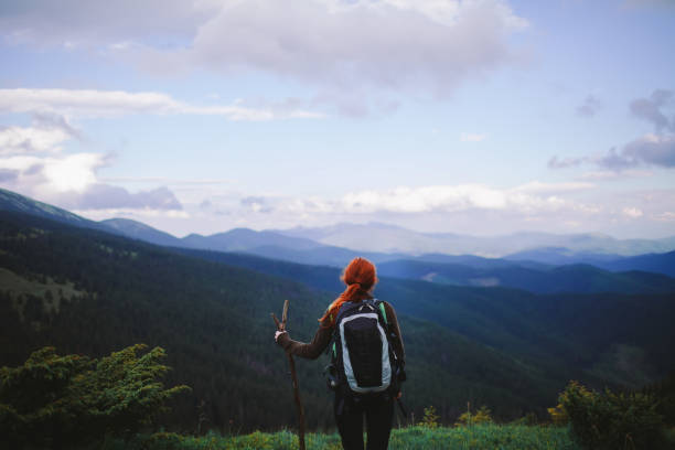 istock Woman hiking in the  mountains 901851422