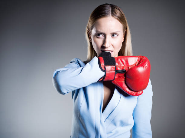 istock Healthy Resolutions. Blonde boxer woman 901854100