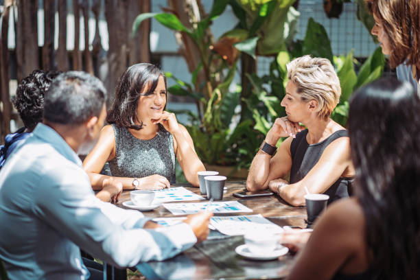 istock Board meeting in relaxed outdoor cafe 901854418