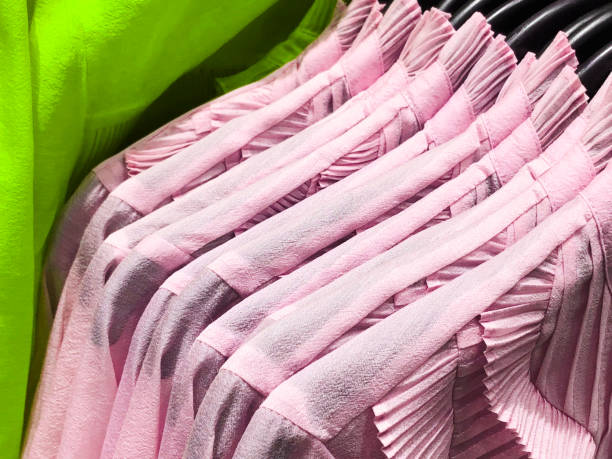 istock Womens shirts on the hanger in the store. 901854644