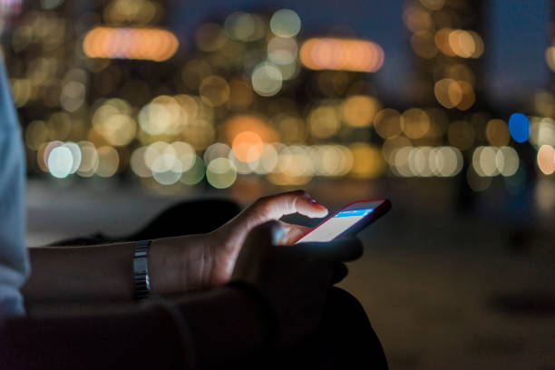 istock Surfing the net in the city with smart phone 901878978