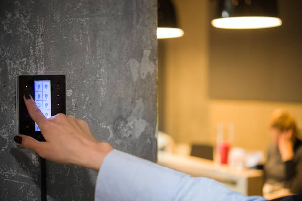 istock girl adjusts the lighting in the room with a touch switch 901880086