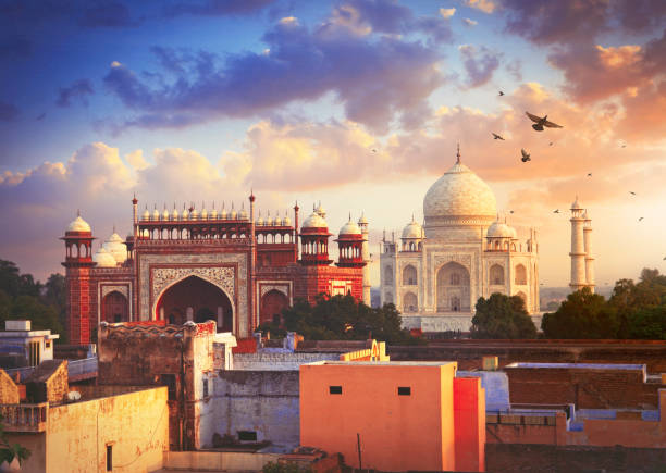Taj Mahal in Agra Taj Mahal in Agra town in sunset light agra stock pictures, royalty-free photos & images