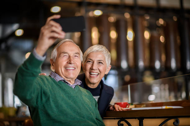 istock Senior couple in coffee shop 901886286