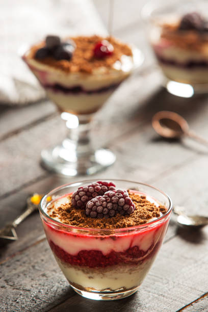 istock Delicious Pudding with Biscuit and Forest Fruits 901892224