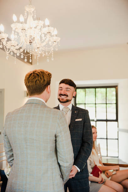 istock Two Men Exchanging Vows On Their Wedding Day 901894980