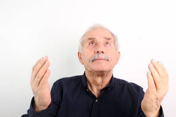 A modern and old muslim guy praying on white background