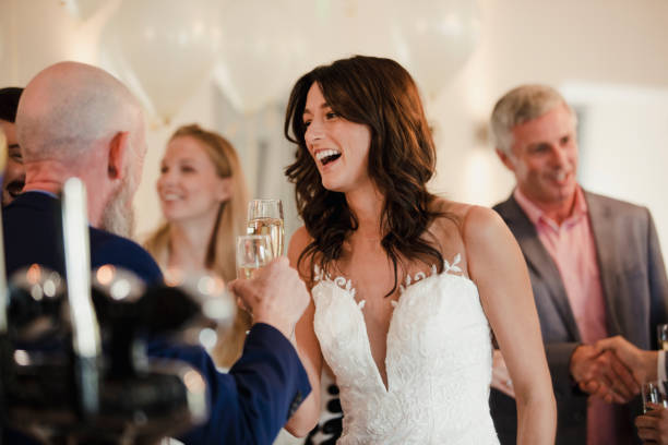 istock Bride Socialising On Her Wedding Day 901903672